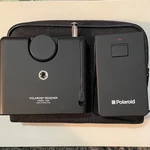 Polaroid Receiver Model 7030 And Transmitter 7020 With Wearable Case Used. Price: $11.00.