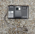 Nikon Coolpix S1000PJ 12.1 Mp Digital Camera W/ Battery Used. Price: $105.00.