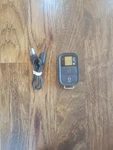 Gopro Remote With Chager Great Condition Working Used. Price: $20.00.