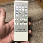 Olympus MAJ-898 Remote Control Authentic Genuine Oem Replacement Used. Price: $19.99.