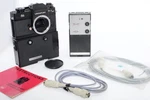 Leicaflex SL-2 35MM Slr Film Camera With Motor. Black. Instr. Cap. Used. Price: $1395.00.