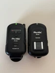 Phottix Ares Wireless Flash Trigger Transmitter & Receiver Set For Camera Used. Price: $50.00.