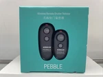 Aodelan Pebble Wireless Shutter Remote Works 80+ Meters. - Open Box Unused. Price: $26.99.