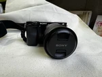 Sony Alpha A6000 Digital Camera 24.3MP Black With Zeiss 4/16-70 Lens Used. Price: $800.00.